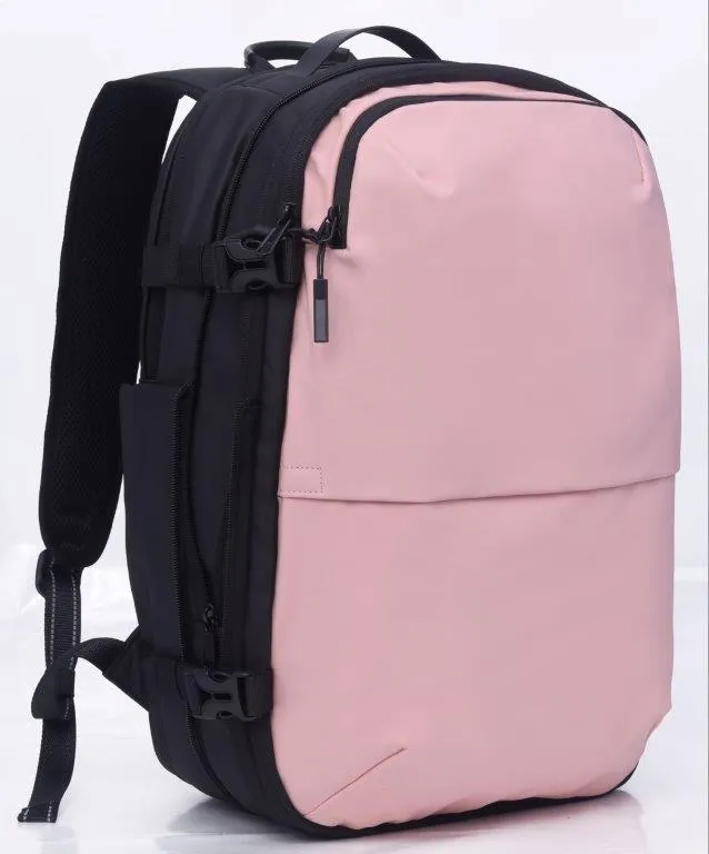 Travelite - Vacuum Compression Travel backpack 17.3in with pump - Pink